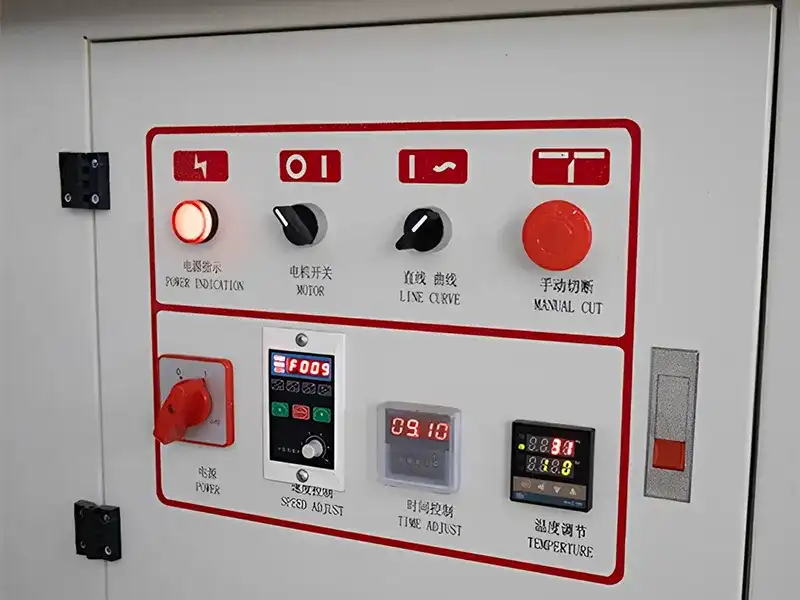 Close-up of the HE-305B manual bevel edge bander integrated control panel featuring digital temperature controllers and feed speed velocity regulation knobs.