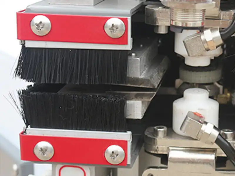 HE-370 fine trimming station utilizing dual high-frequency motors for synchronous top and bottom edge radius profiling.