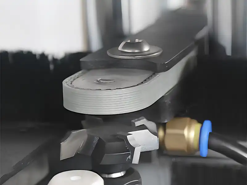 HE-370 synchronized profiling power-wheel trimming system utilizing specialized tracing wheels for flush edge radius contouring.